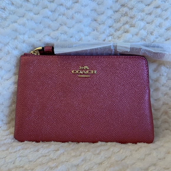Coach Handbags - SALE! COACH METALLIC PINK WRISTLET.